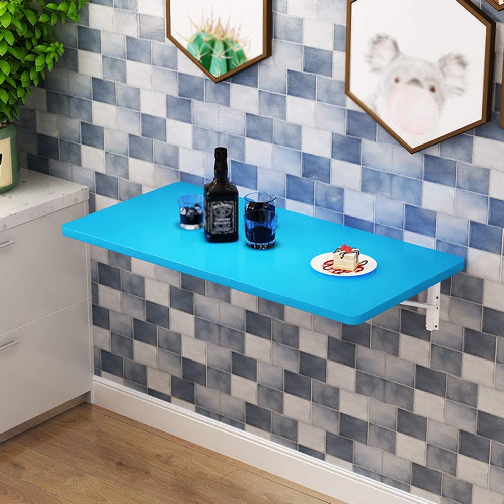 Table pliante à abattant murale pour gagner de la place dans un studio