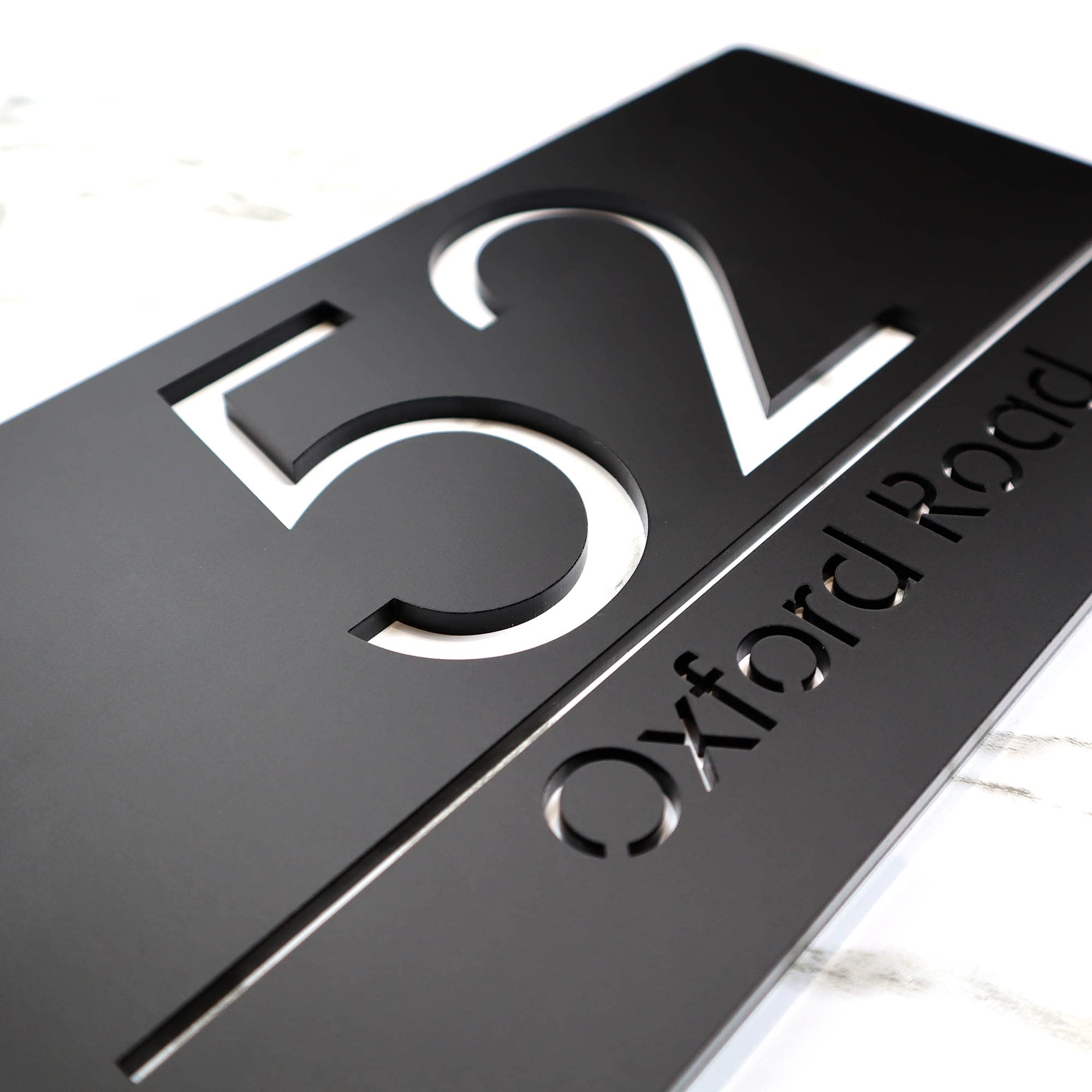 K Smart Sign | Bellissima A4 F31 | Matt Black Personalised House Signs Laser Cut 3d Door Numbers Street Address Number Plaques | 300mm x 160mm (Matt Black & White Marble Effect)