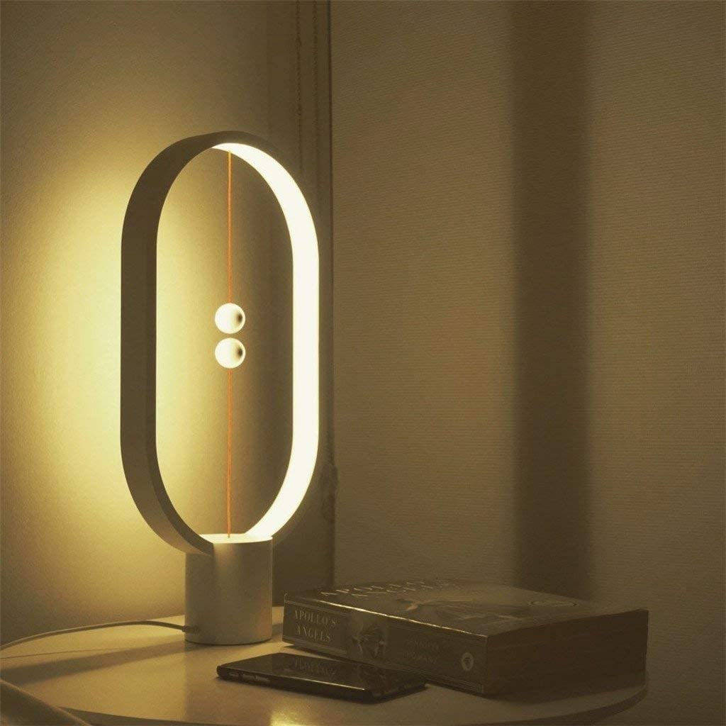Lampe de table magnétique Heng Balance High-Tech Simple Creative Intelligent LED Balance Lampe de bureau à interrupteur magnétique à moitié vide, avec port de charge USB Bureau Chambre d'enfant