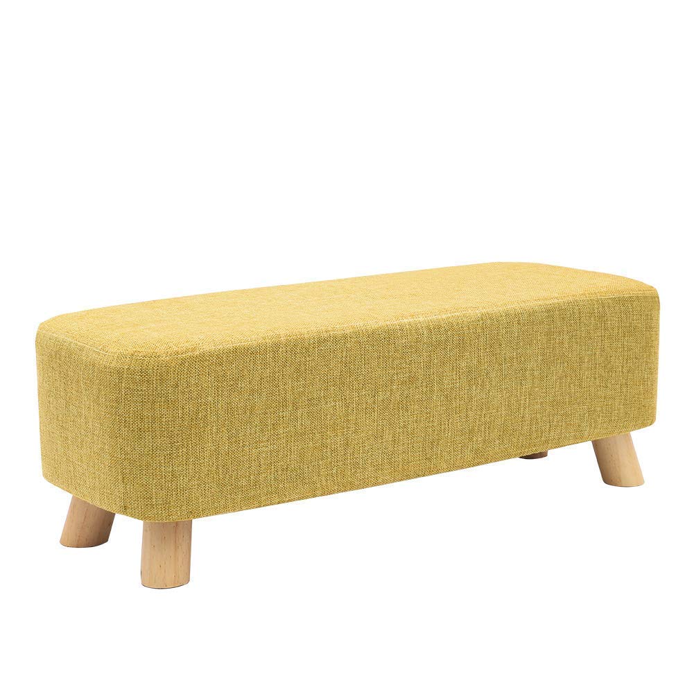 Tabouret en tissu de lin vert pour soulager les jambes au salon