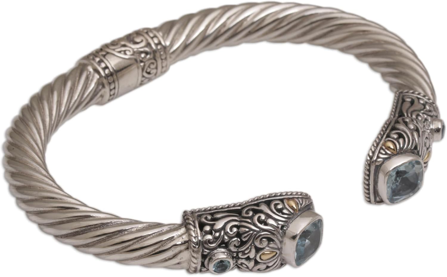 NOVICA Artisan Handmade Blue Topaz Gold Accent Cuff Bracelet Sterling Silver with Accents Tone Indonesia Gemstone Birthstone [6 in L (end to End) x 0.5 in W] ' Dazzling Crest'