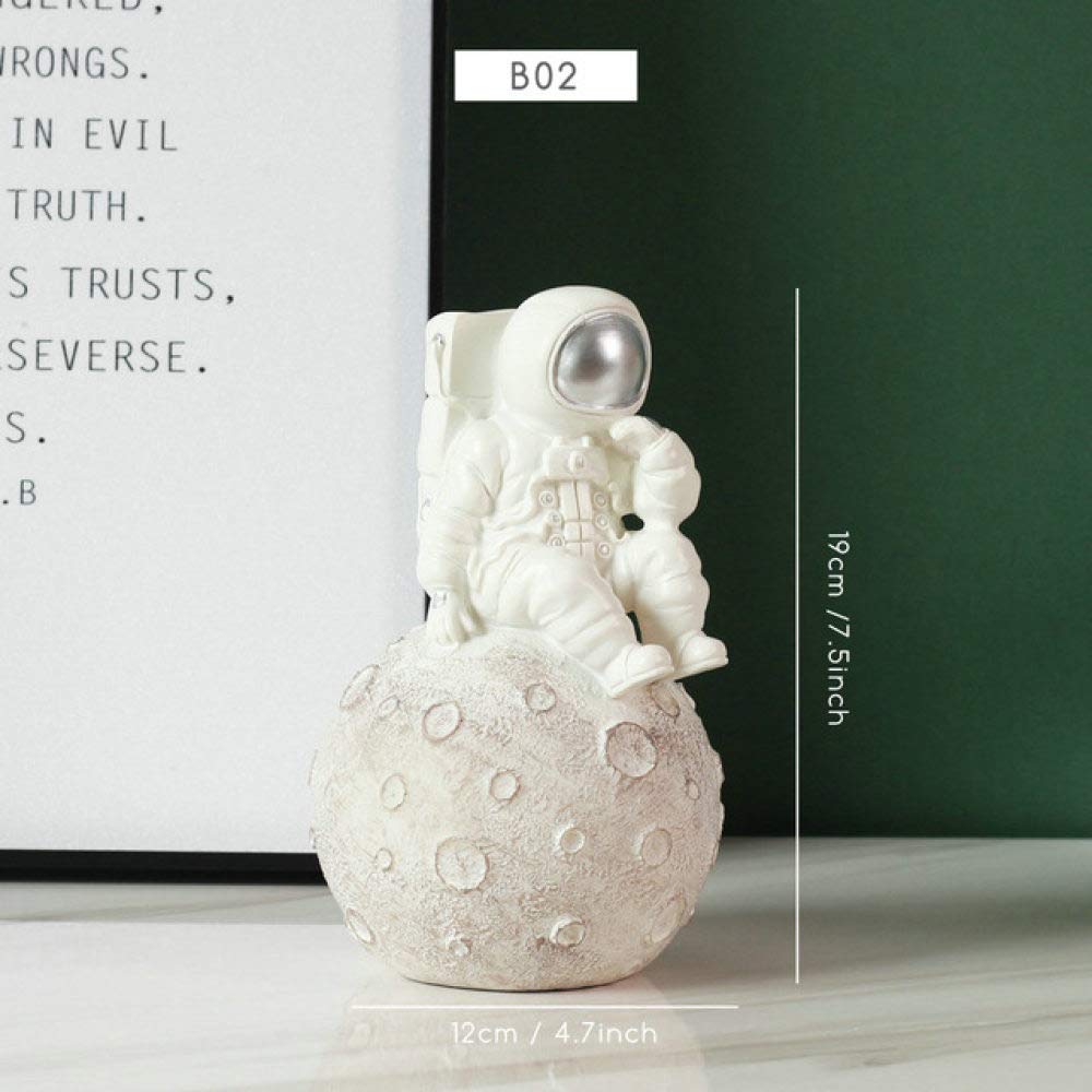 Figurine astronaute résine argentée B02, l'astuce pour embellir un bureau vide facilement