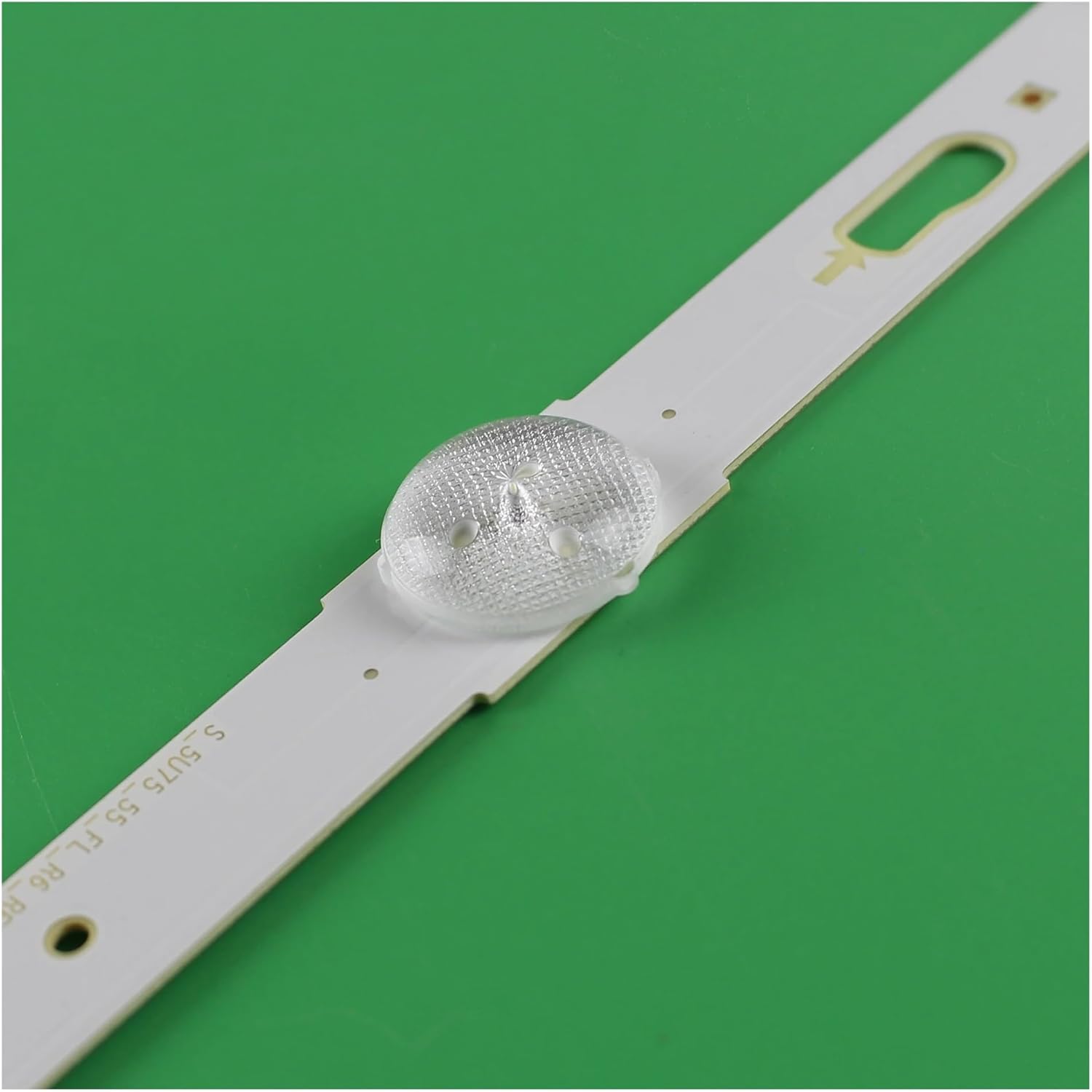 Close-up of an individual LED backlight strip, highlighting an LED lens.