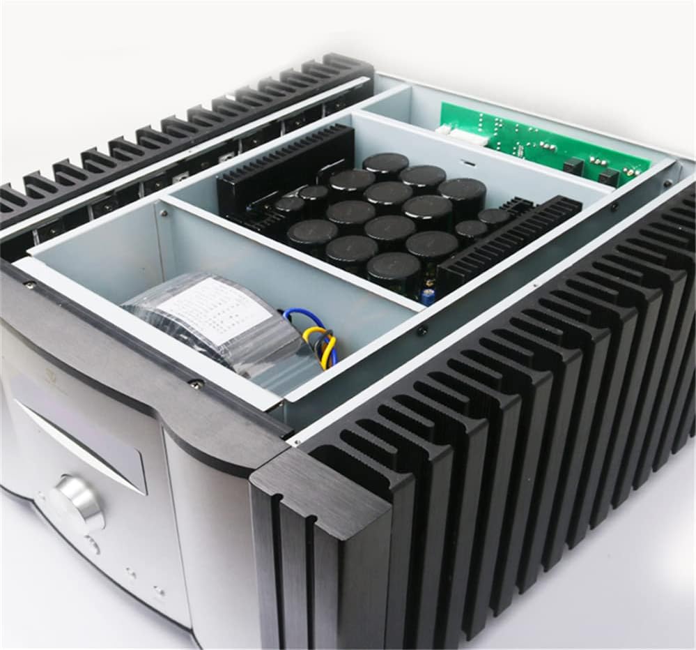 Internal view of the Tone Winner AD-2PRO amplifier, showing capacitors and circuit boards.