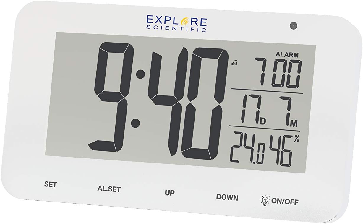 Close-up of the Explore Scientific RDC1004 clock's display, highlighting the digital readouts for time, alarm, temperature, and humidity.