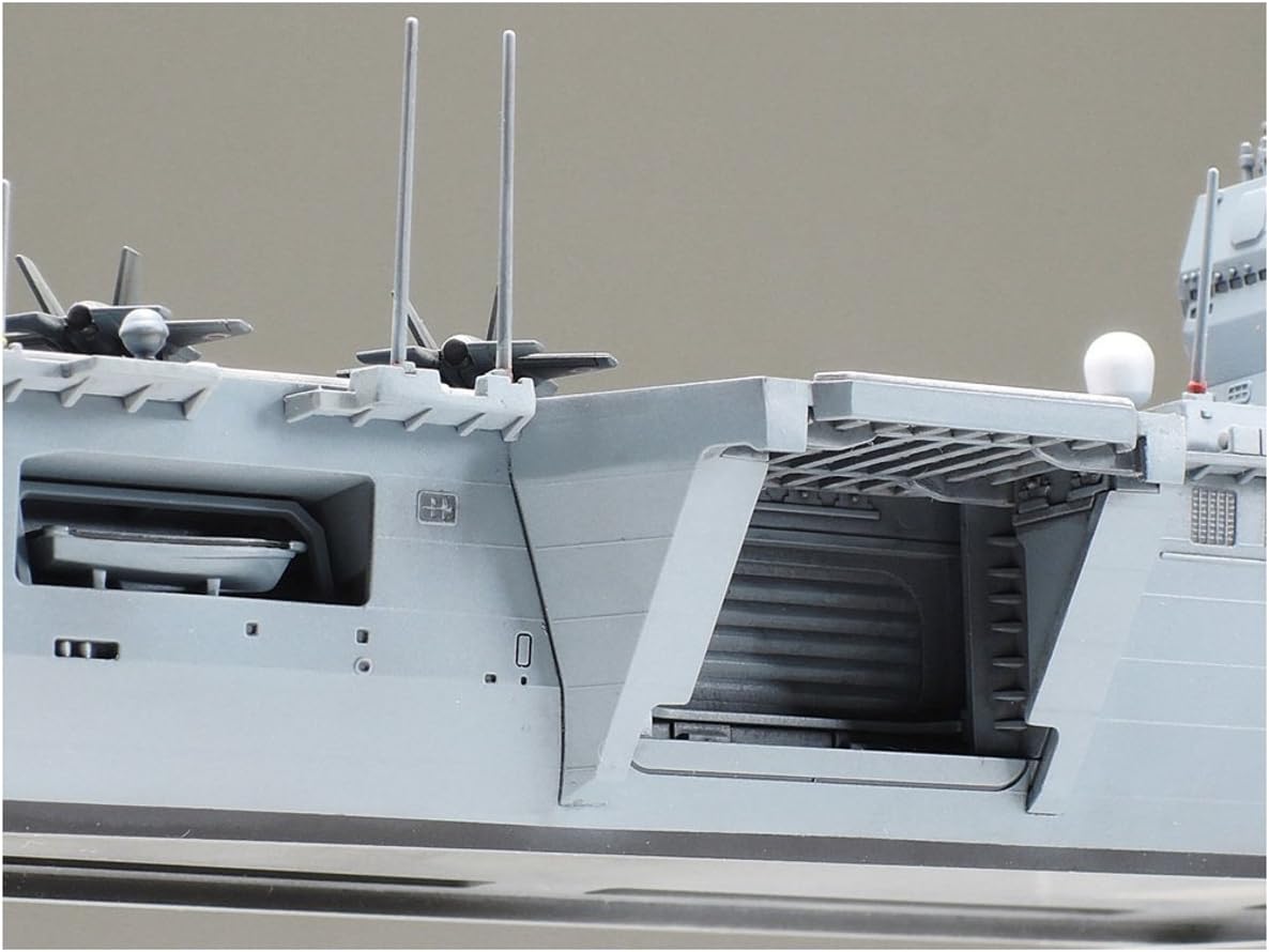 Side view of the Tamiya 1/700 Aircraft Carrier DDV192 Ibuki model, showing an open hangar bay or elevator shaft.