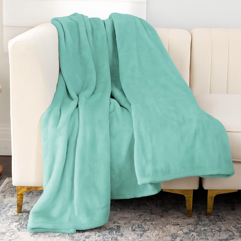 Nicole Miller Oversized Plush Fleece Throw Blanket – Ultra Soft, Lightweight & Cozy – 60" x 70" Warm Flannel Blanket for Couch, Bed & Travel – Machine Washable (Off White-Ivory)