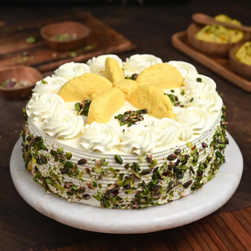 Bakingo Delicious Silky Smooth Fresh Creamy Pista Rasmalai Eggless Cake For Birthday Cake, Anniversary Cake, Valentine's Day Cake, Mother's Day Cake (Same Day Delivery) (0.5Kg)