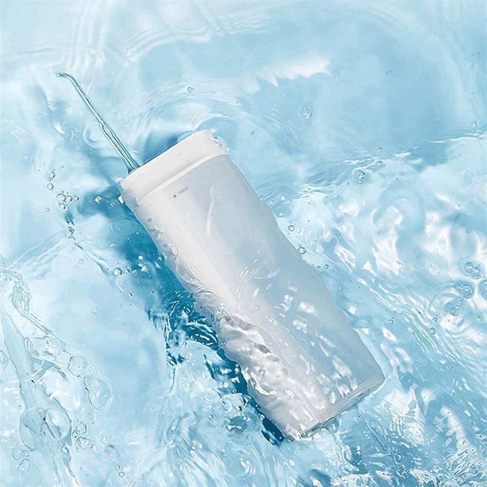GeRRiT Idropulsore Senza Fili, pulitore Dentale Professionale for Denti, 3 modalità IPX7 Irrigatore Orale Impermeabile con 2 Punte, Portatile e Ricaricabile