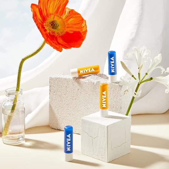 NIVEA Sun Protect Caring Lip Balm (4.8g), Lip Moisturiser with Shea Butter and SPF 30, Protects Against UVA/UVB Rays with 24H Moisture, Melt-in Lip Care