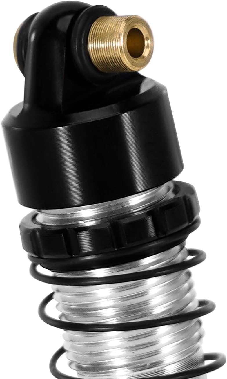 Complete package contents including four black and silver shocks, multiple sets of springs, and various small mounting hardware pieces.