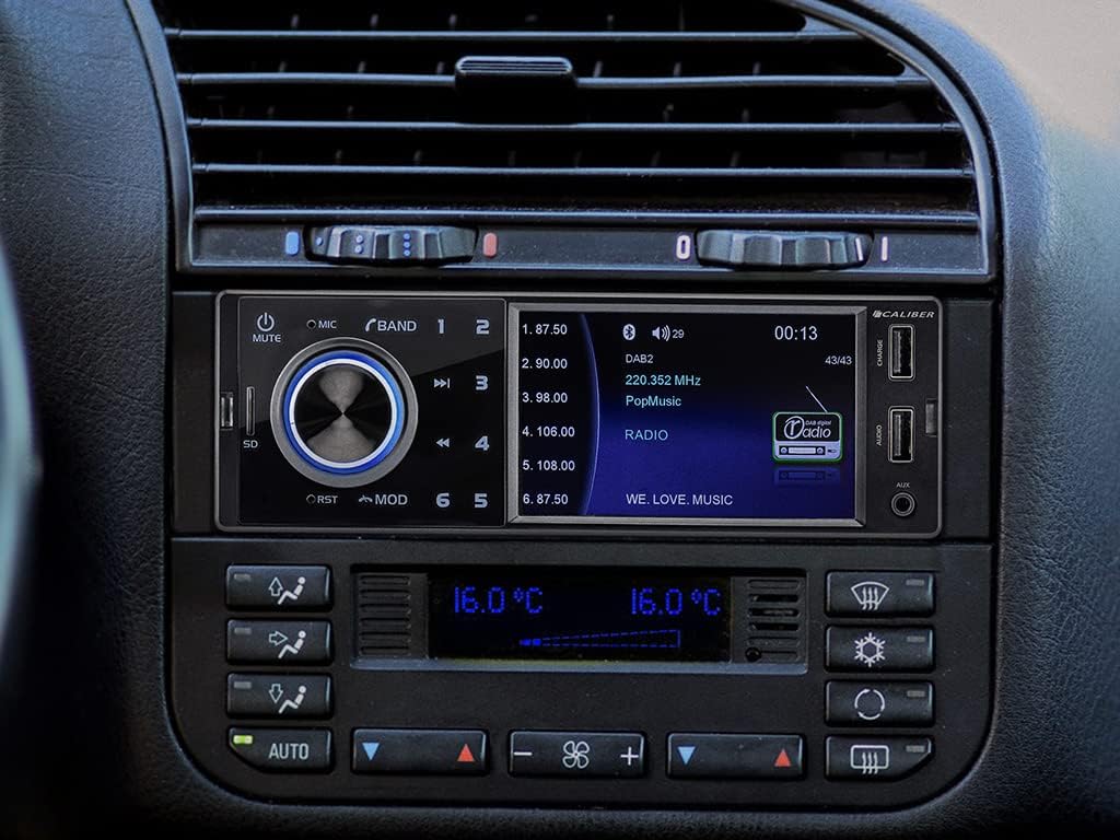Caliber RMD402DAB-BT car radio installed in a car dashboard, showing the radio display.