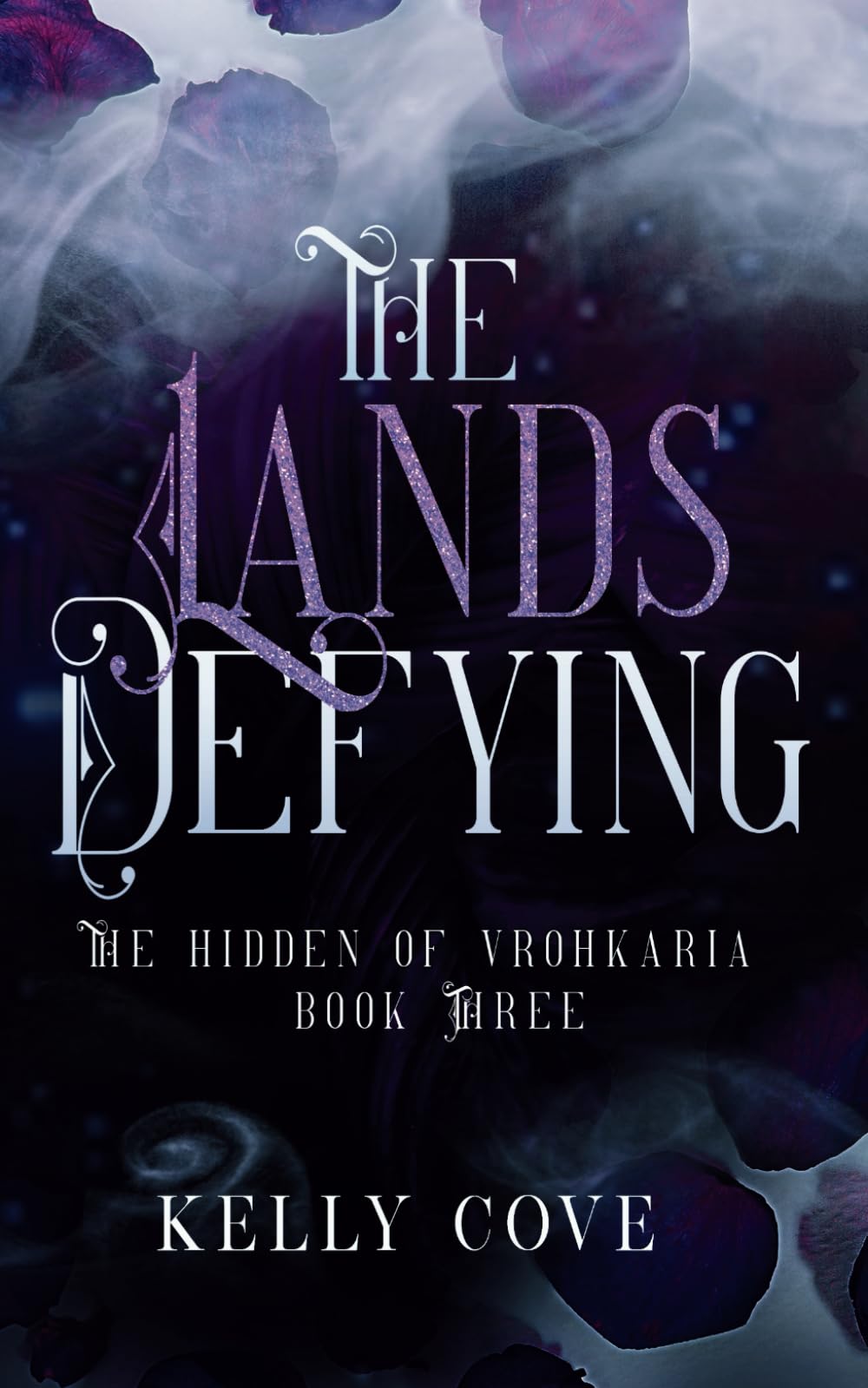 The Lands Defying - A Dark enemies to lovers Fantasy Romance (The Hidden of Vrohkaria Book Three)