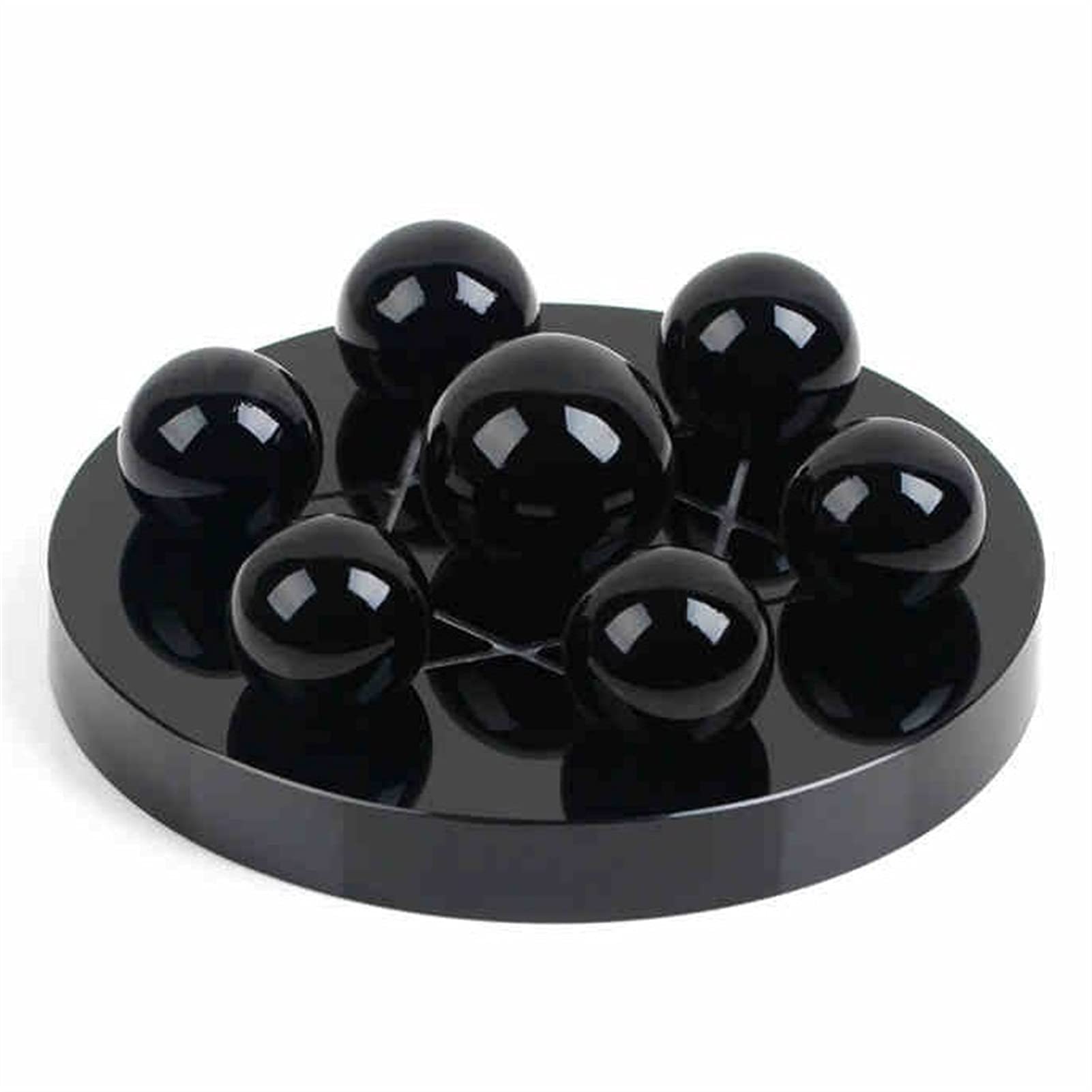 Boule de cristal et star array en obsidienne pour harmoniser votre décoration de salon