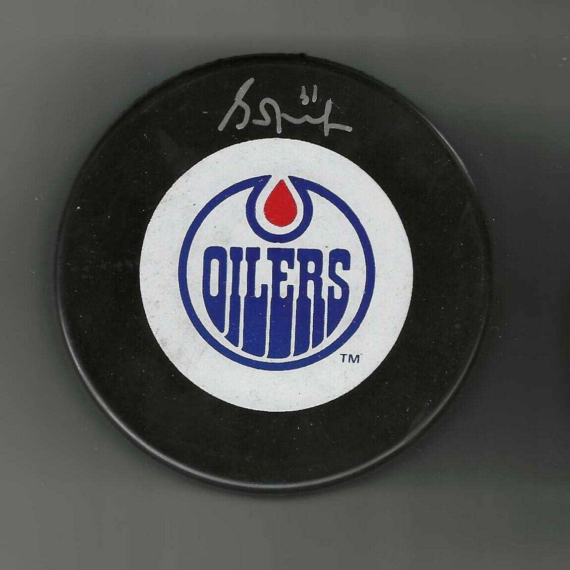 Grant Fuhr Signed Edmonton Oilers Vegum Slovakia Puck - Autographed NHL Pucks
