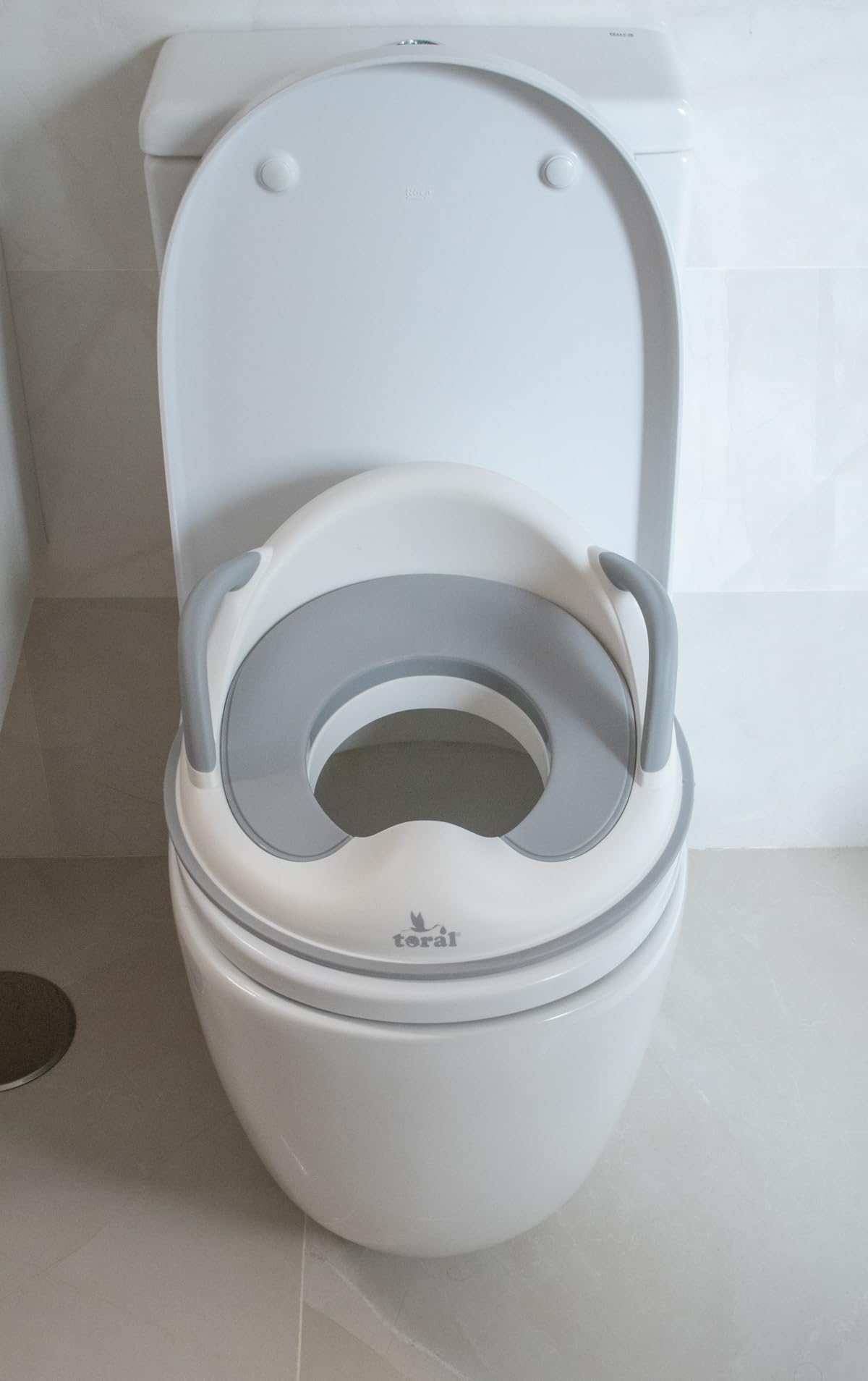 Toral Asiento Reductor con Asas para WC. Ayuda al aprendizaje de bebés y niños. Adaptador infantil portátil para váter MundiBebé +18 meses. Modelo Comfort