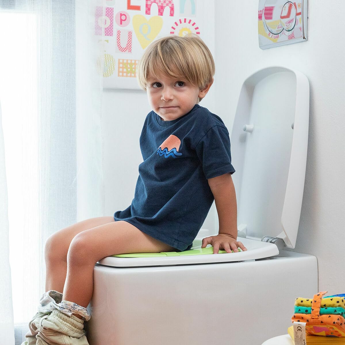 InnovaGoods® Adaptateur de siège de toilette pour enfants, siège de toilette pour enfants pliable avec base antidérapante, peu encombrant, siège de bébé portable, facile à nettoyer et à transporter.