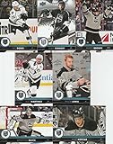 2017-18 Upper Deck Complete Los Angeles Kings Team Set of 13 Cards: Alec Martinez(#86), Anze Kopitar(#87), Derek Forbort(#88), Dustin Brown(#89), Jonathan Quick(#90), Nic Dowd(#91), Trevor Lewis(#92), Jeff Carter(#333), Darcy Kuemper(#334), Tyler Toffoli(#335), Tanner Pearson(#336), Christian Folin(#337), Jussi Jokinen(#338)