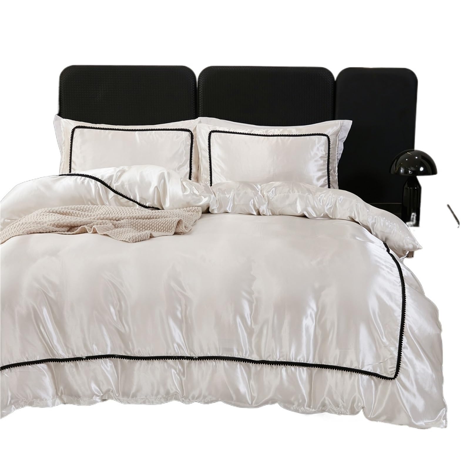 Parure de lit en satin de soie noire pour transformer votre chambre en suite d'hôtel