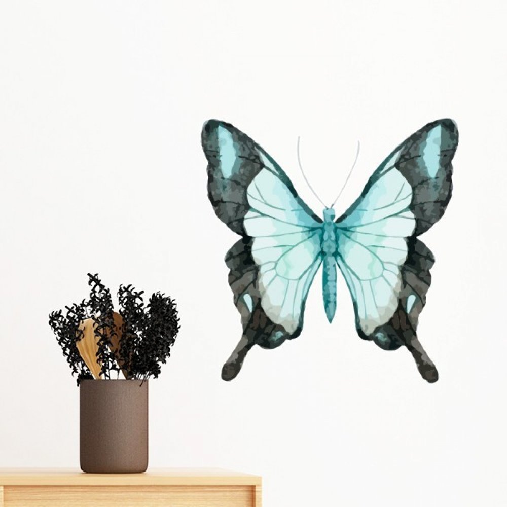 Sticker papillon bleu ailes lumineuses 40cm pour masquer les imperfections d'un mur