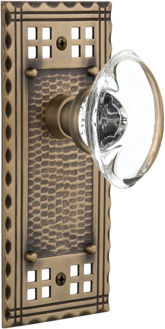 Nostalgic Warehouse Craftsman Plate Single Dummy Oval Clear Crystal Glass Door Knob in Timeless Bronze