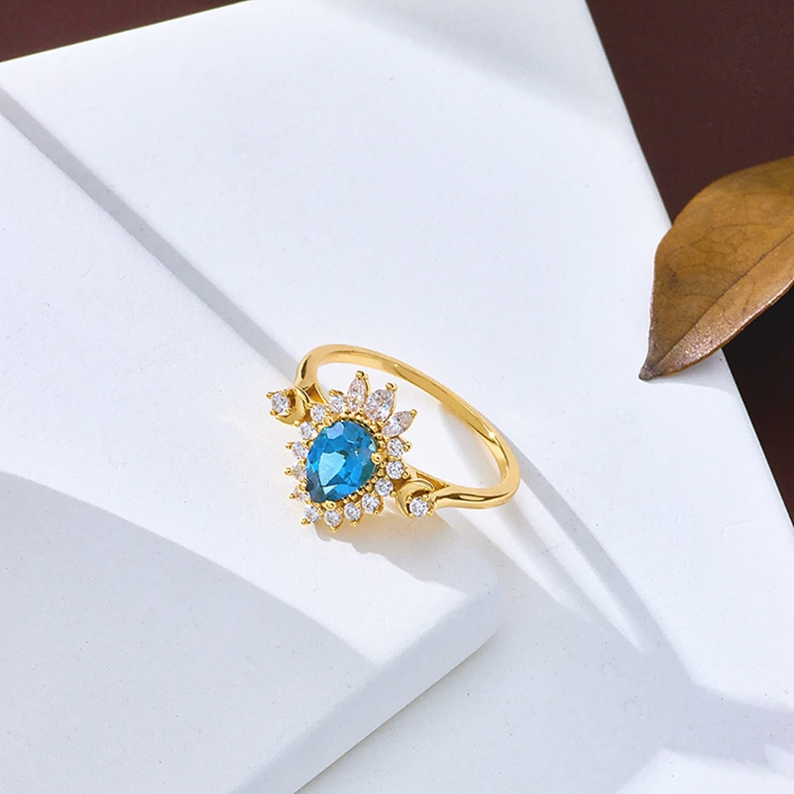 Anillo de boda de oro amarillo Au 375/585/750 con gotas de topacio azul, forma de flor