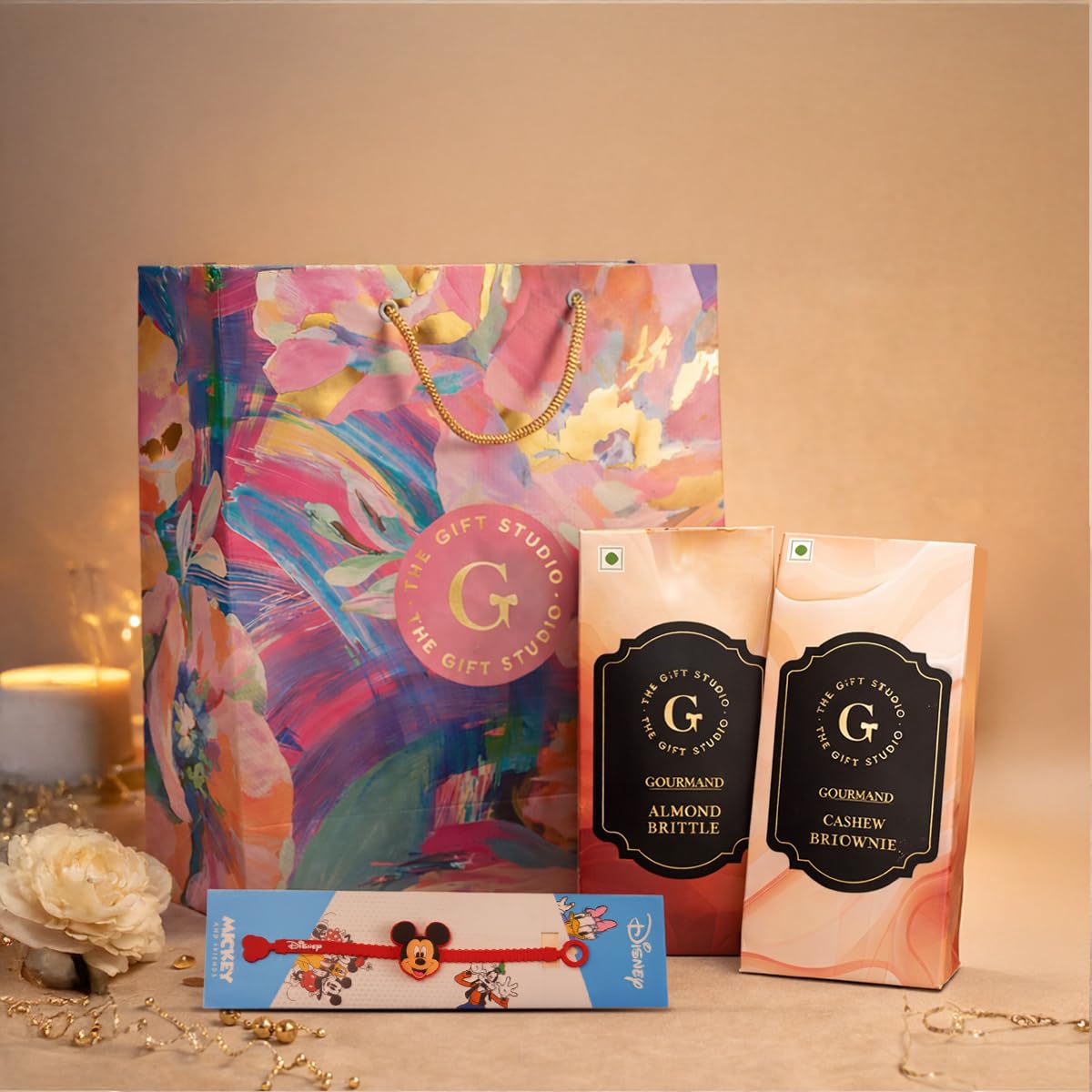 THE GIFT STUDIO.COM | Disney Mickey Mouse Rakhi Gift Hamper for Kids | Cashew Brittle, Almond Brittle & Floral Bag | Raksha Bandhan Gift-image-22