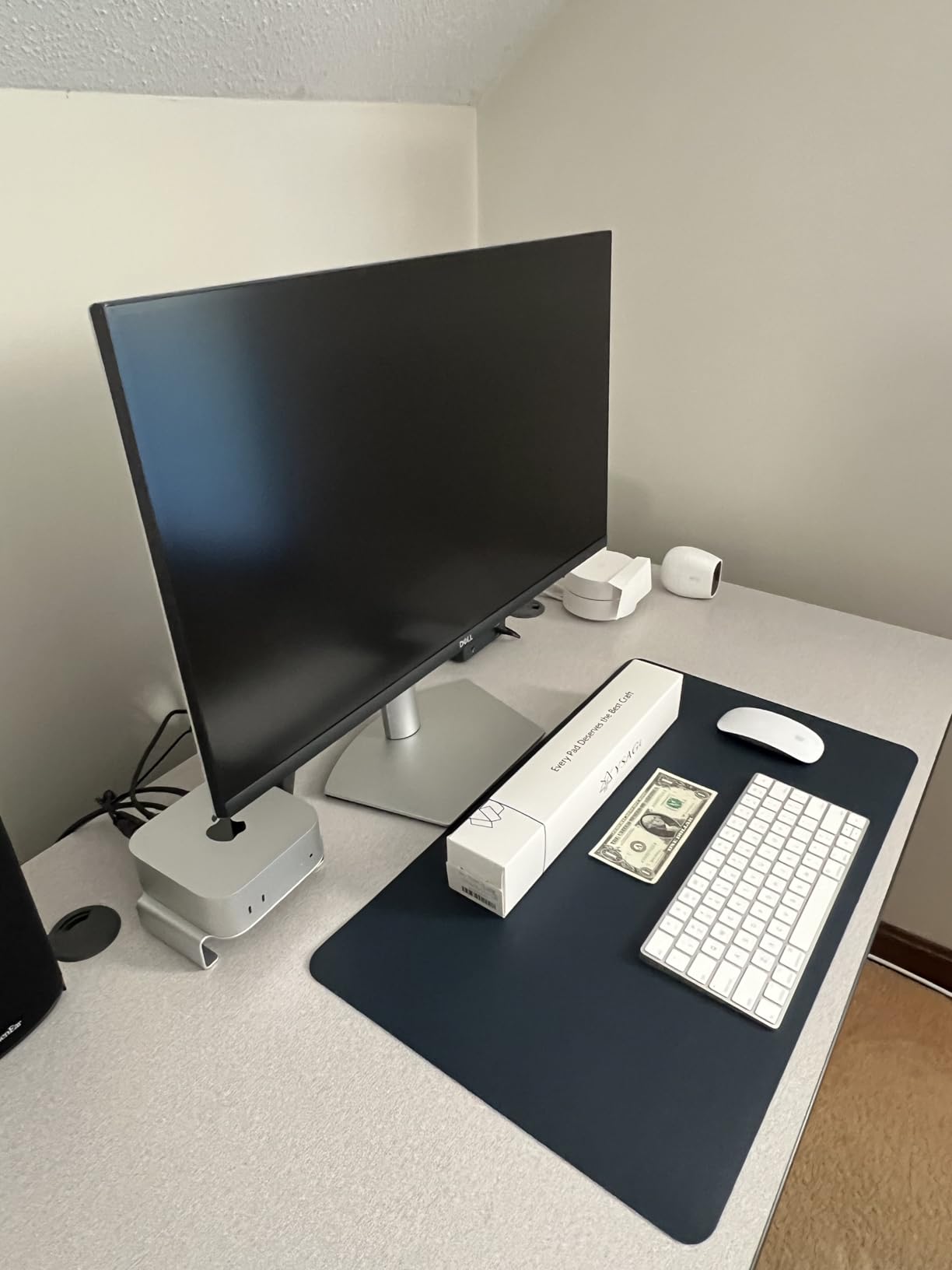 Side view of desk setup with mat