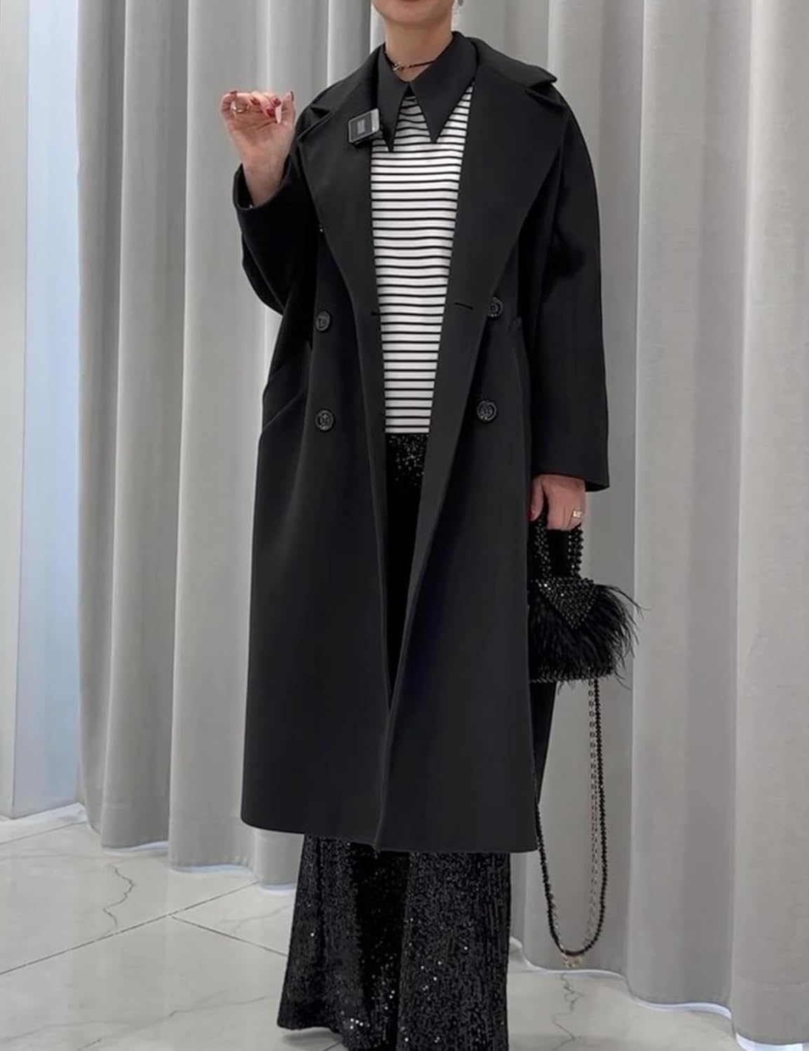 Classic Black Overcoat Styling with a Modern Twist