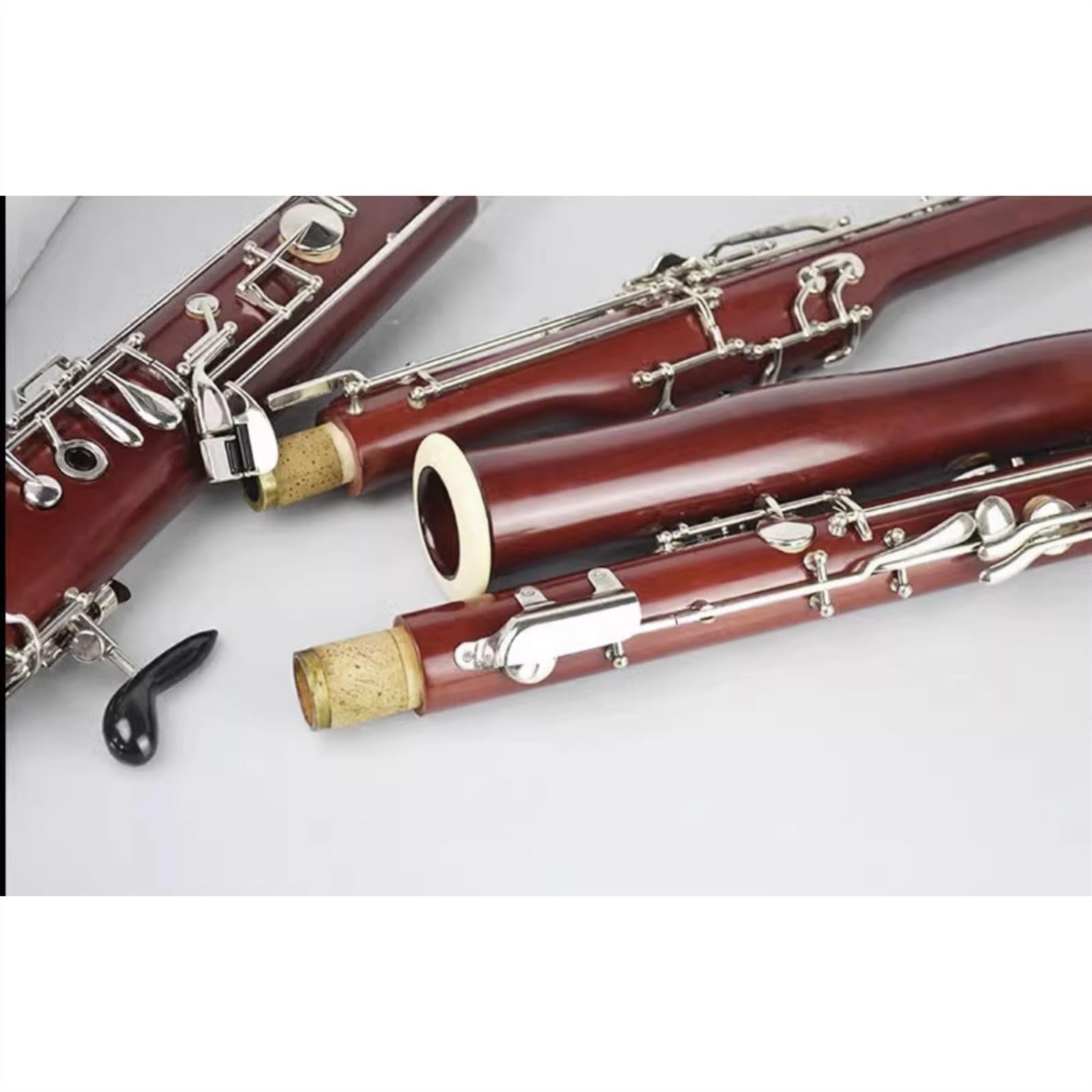 Strumento Per Fagotto Con Tasti Nichelati In Rame Bianco E Prestazioni Professionali Con Custodia Set con Fagotto