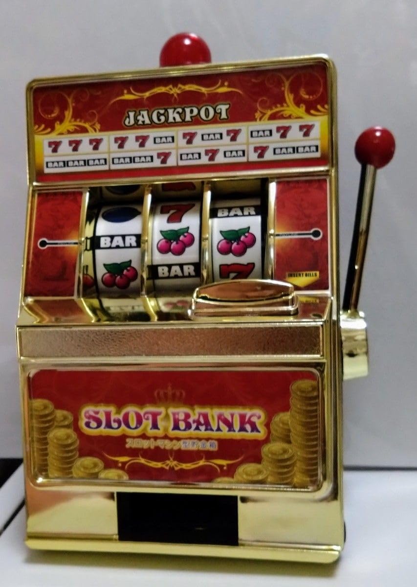 スロット式　貯金箱 Amazon.co.jp: 電動スロットマシン(貯金箱式) : おもちゃ