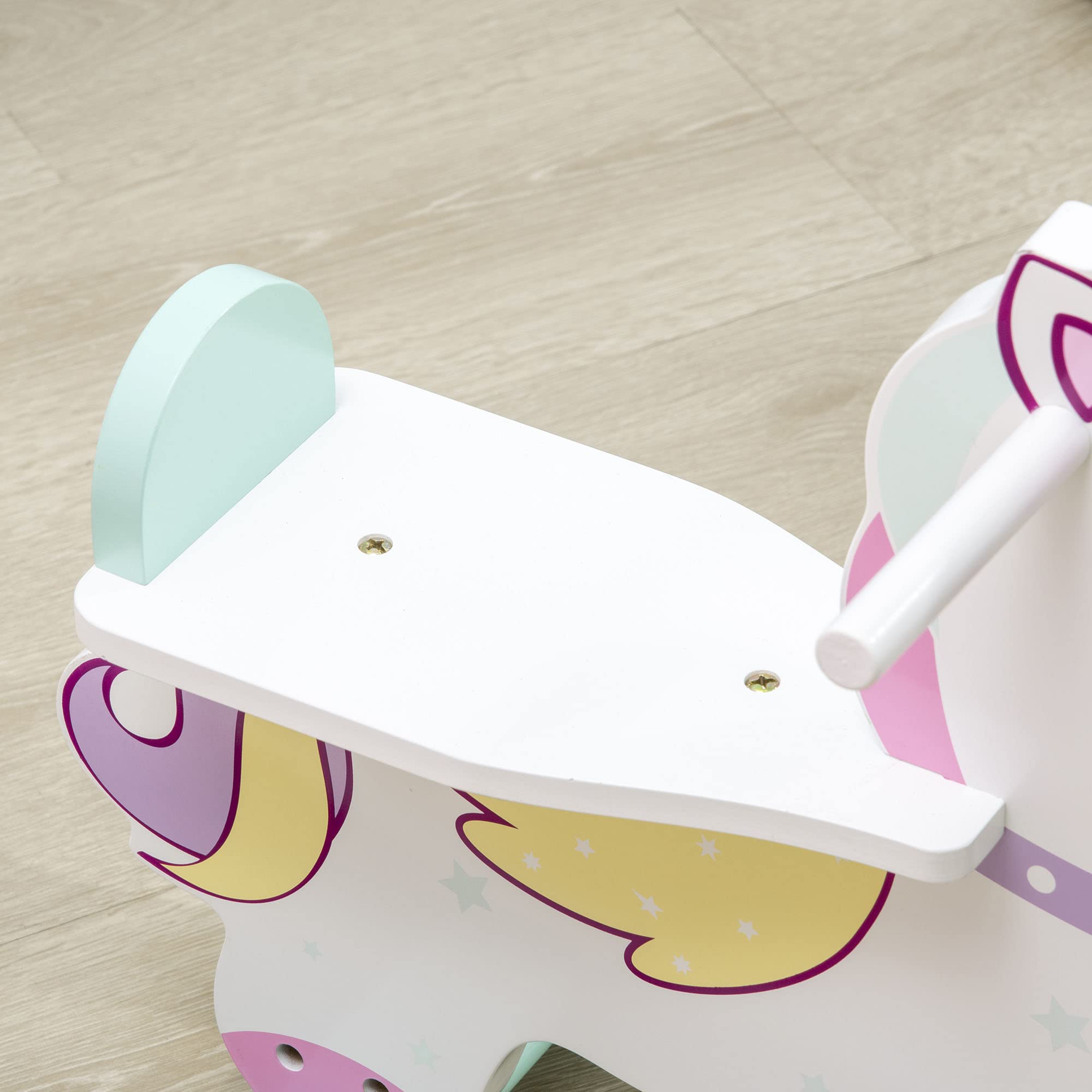 HOMCOM Caballo balancín para niños de 1 a 3 años, caballito balancín con asas, respaldo y pedales de MDF, 68 x 27 x 47,5 cm, azul, rosa y blanco