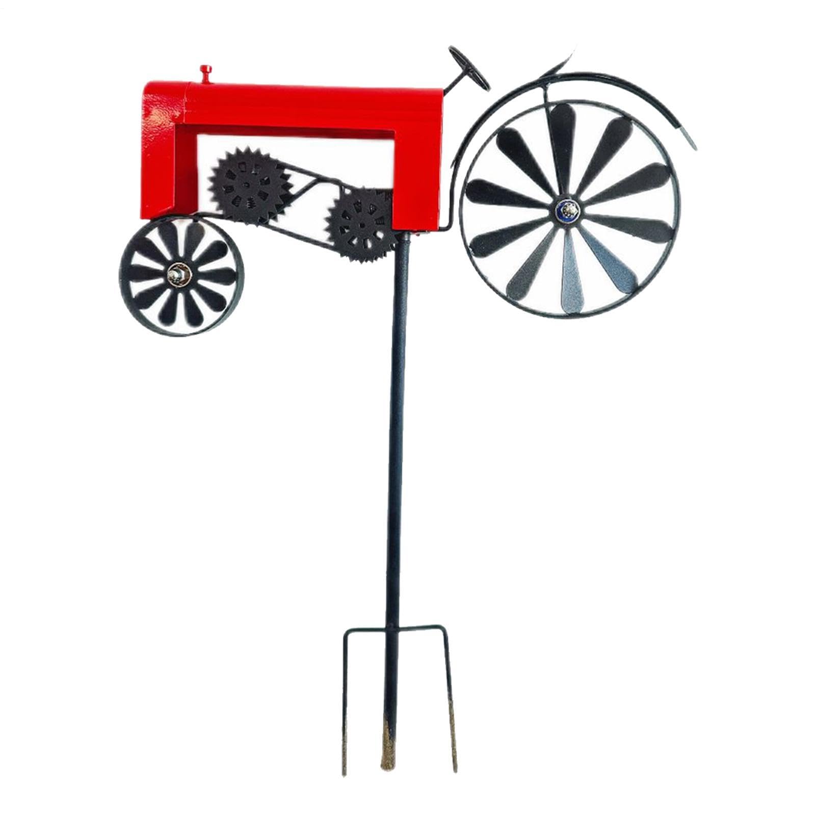 Sculpture cinétique tracteur pour animer un parterre et une pelouse