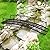 ide·o 8FT Metal Garden Bridge - Metal Iron Arc Walkway with 770 lbs Weight Capacity, 2 Safety Siderails, Vine Motifs, Easy Assembly for Backyard Fish Pond, Stream, Creek, Bronze (96”*28”*17”)