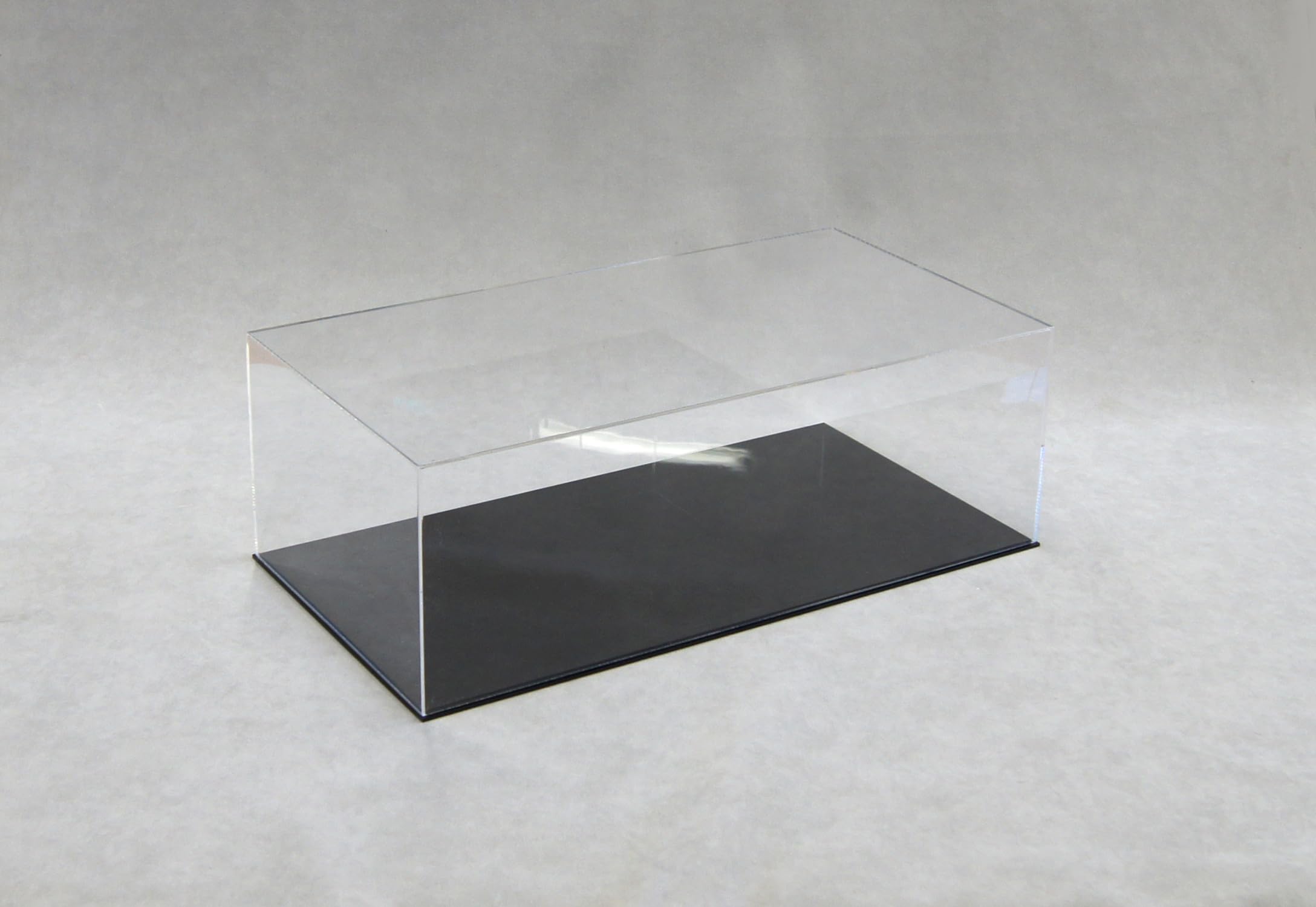 ORUS - Teca con base nera 60 x 30 x 20h cm.