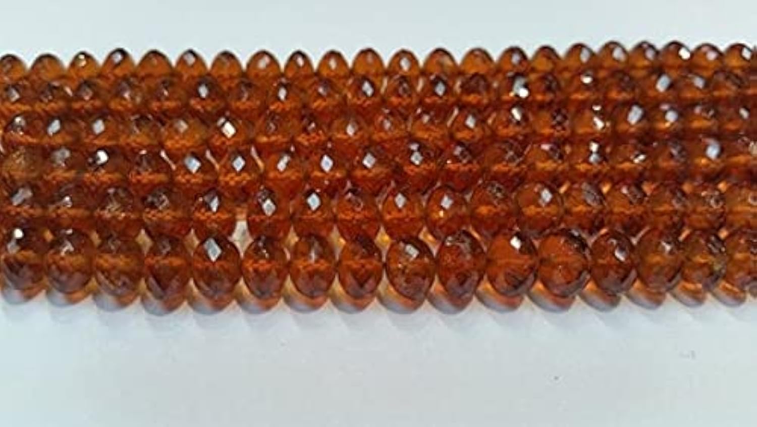 Spessartite Faceted Rondelle 7 To 10mm connectez-vous à l'énergie de la terre
