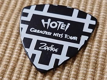 【新品・未開封】布袋寅泰 92ツアーグッズ G柄シルバーピック型ネックレス 新品・未開封】布袋寅泰 92ツアーグッズ G柄シルバーピック型