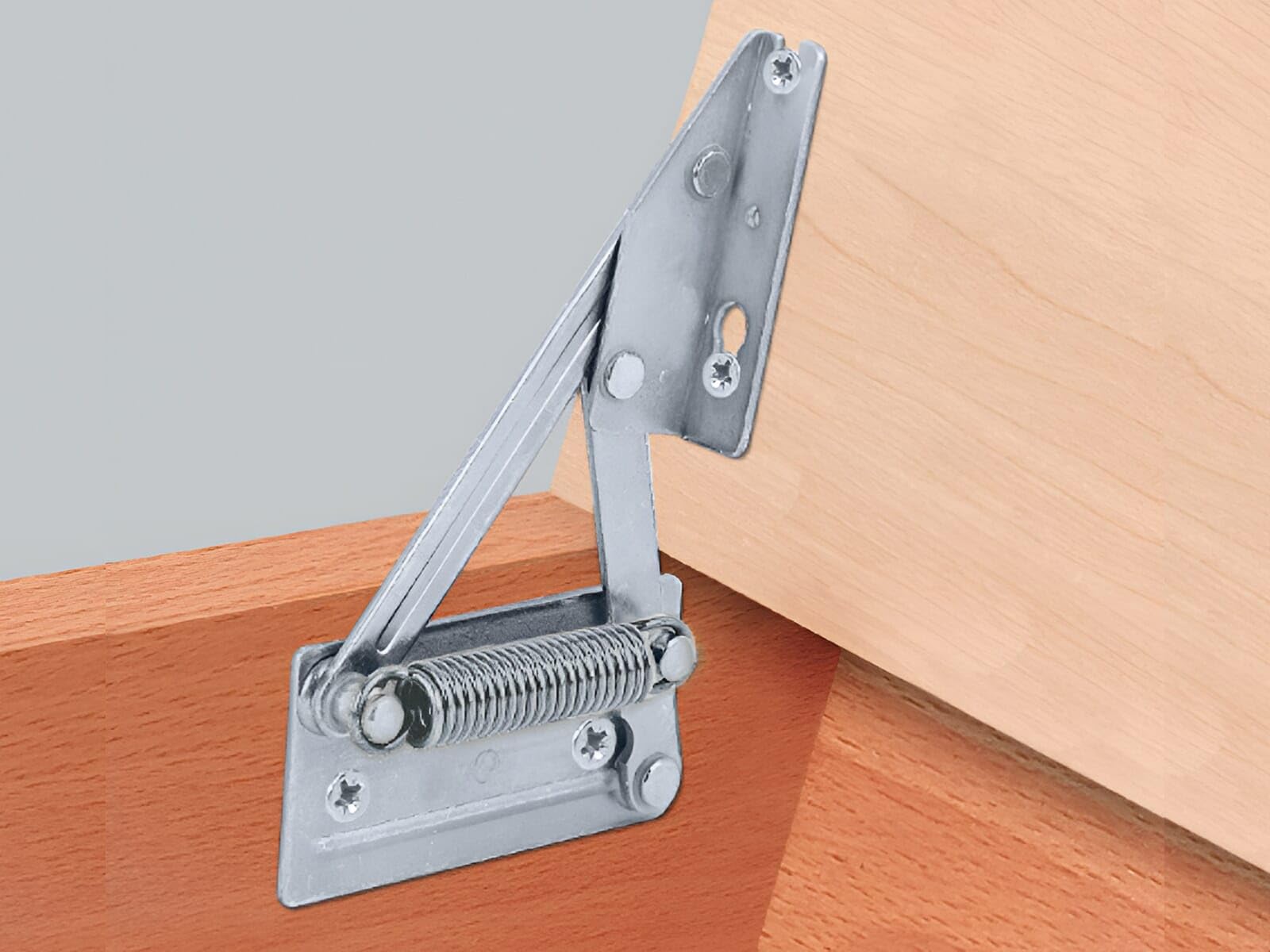 Coppia cerniera braccio per cassapanca, per ripiano in legno, con molla 643.01.525