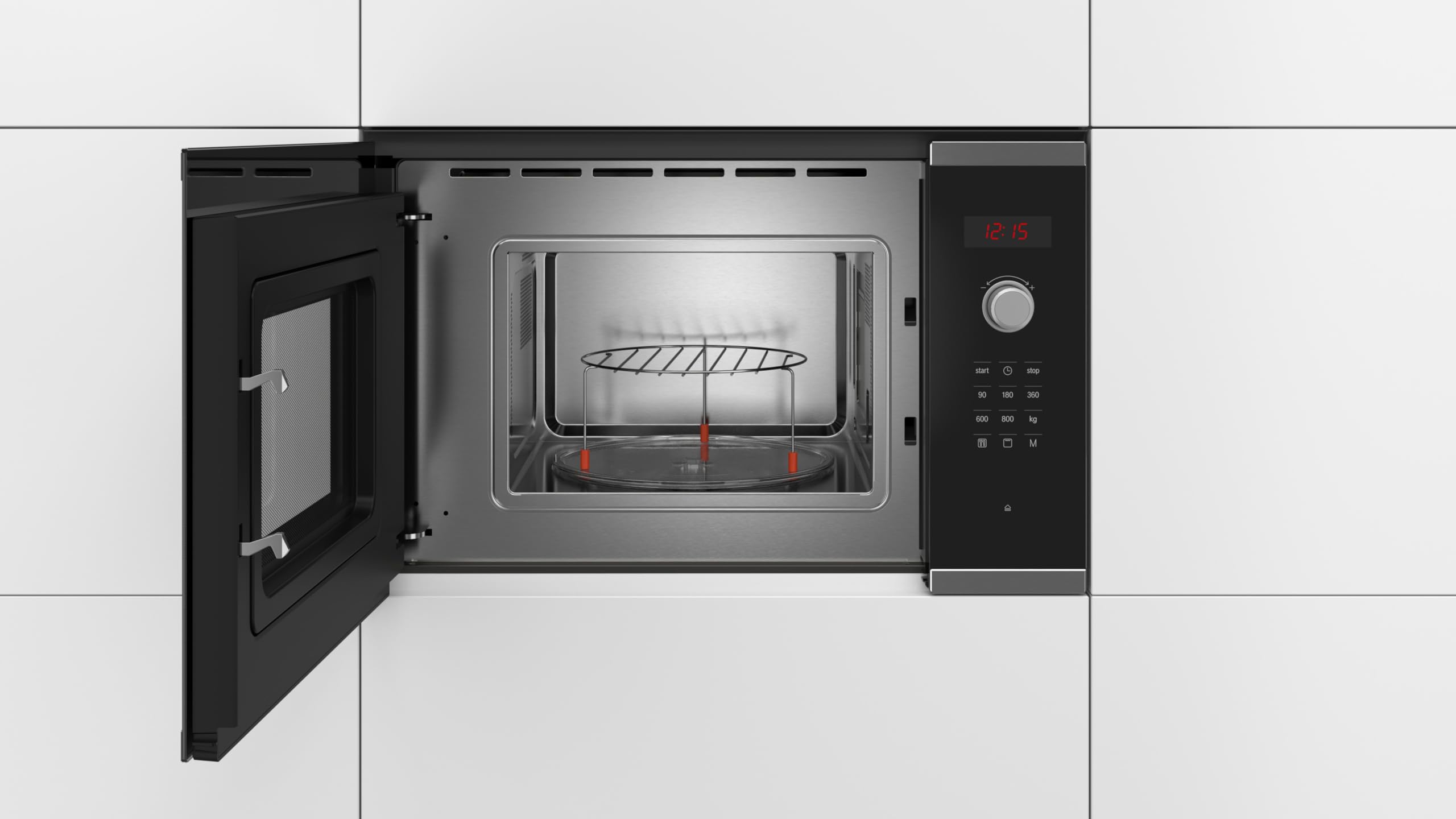 Forno a microonde Bosch BEL523MS0 integrato in un mobile da cucina, con lo sportello aperto che rivela l'interno in acciaio inossidabile, il piatto girevole in vetro e la griglia.