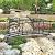 Kinsunny 8 Ft Metal Garden Bridge with Safety Patterned Siderails, Outdoor Decorative Extra Long Iron Garden Arch Bridge Footbridge for Pond, Creek, Stream (Black)