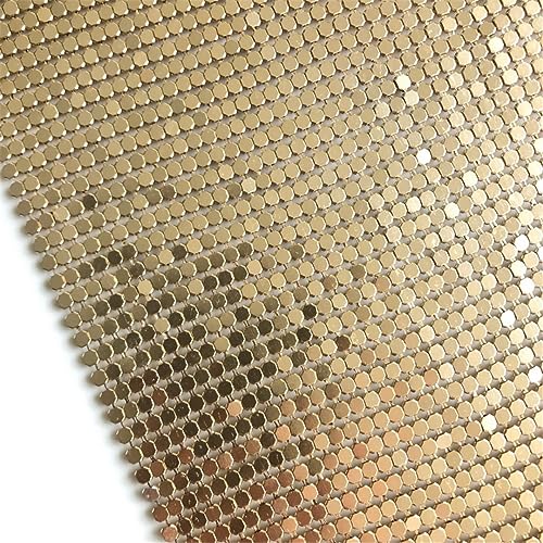 Tissu en métal doré 45x150cm idéal pour confectionner une robe de défilé