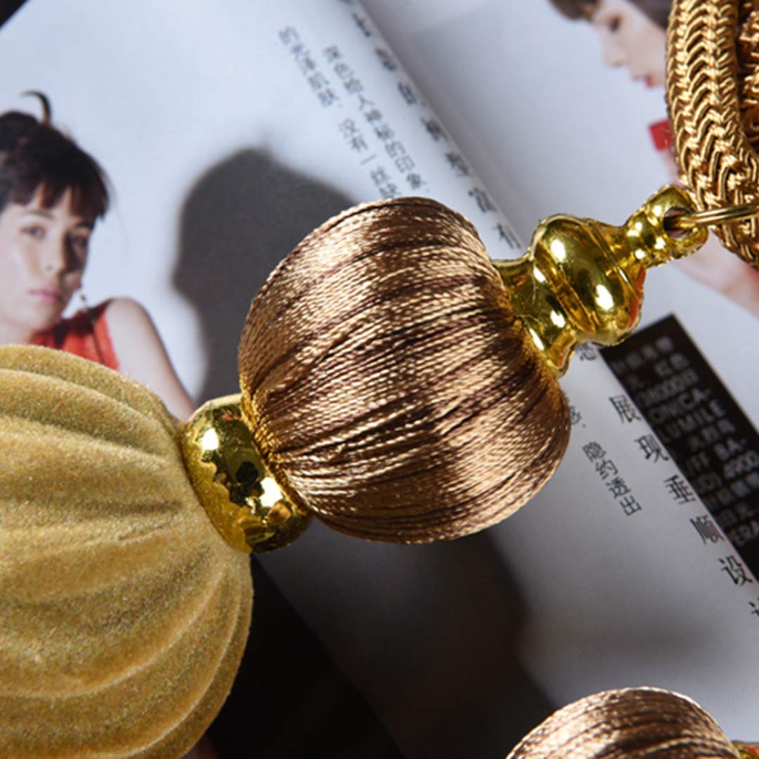 1 paire d'embrasses de rideaux à pompons uniques en forme de citrouille à suspendre (doré)