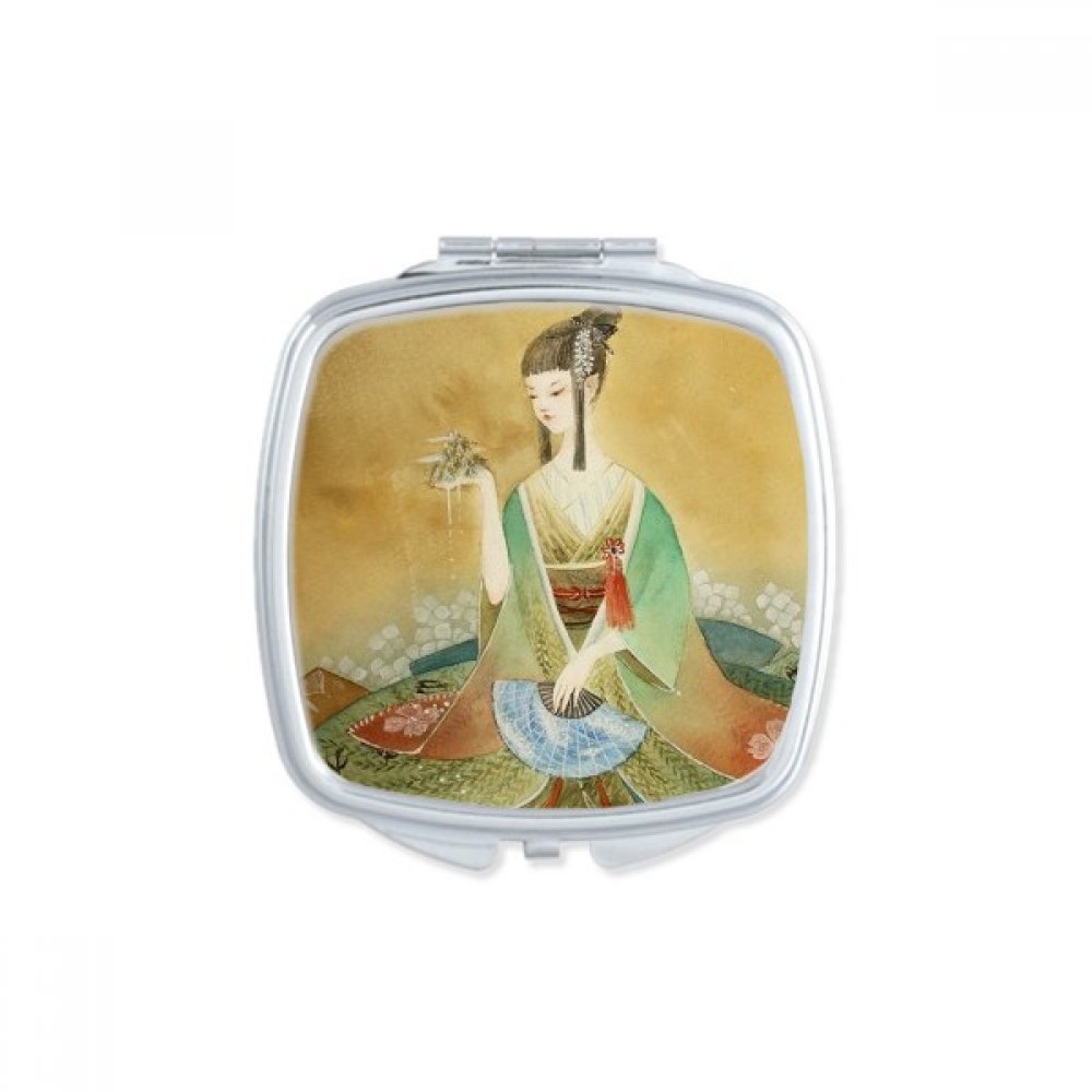 Miroir de poche grue blanche dans votre sac pour retouches maquillage