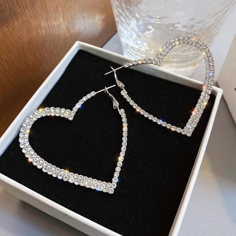 Bijoux de mariage LAMGUL pour sublimer une robe de mariée avec cœurs suspendus