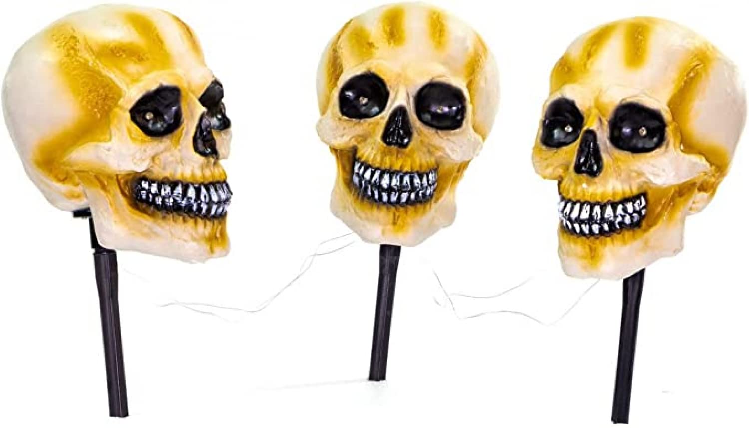 Haunted Hill Farm Talking Skull Lawn Pile Twinkling Eyes and Spooky Sounds Battery Powered Lawn Garden Outdoor Halloween Decor High Resolution Photo