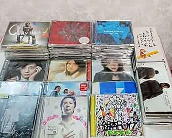 Amazon.co.jp: 中古 レンタル落ち CD 合計70枚セット 中古CD 12枚