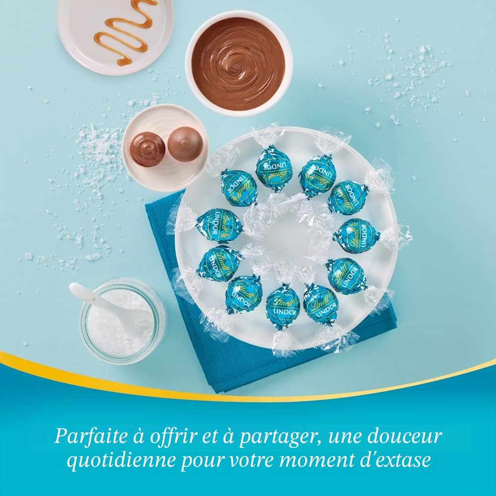 Lindt Lindor Caramello Salato Pralines au chocolat au lait et cristaux de sel avec caramel doux salé 200 g