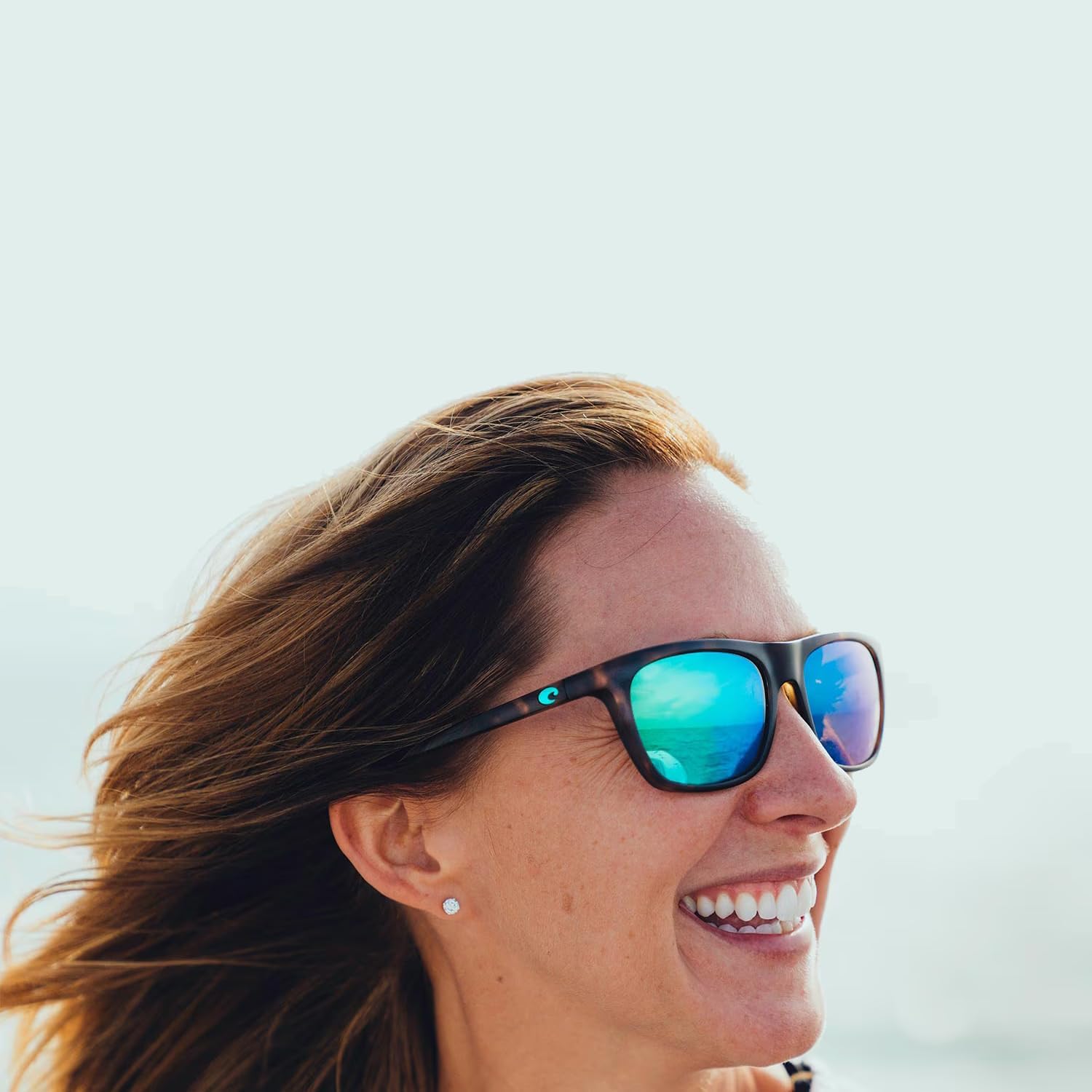 Costa Woman Sunglasses Shiny Wahoo Frame, Blue Mirror Lenses, 57MM