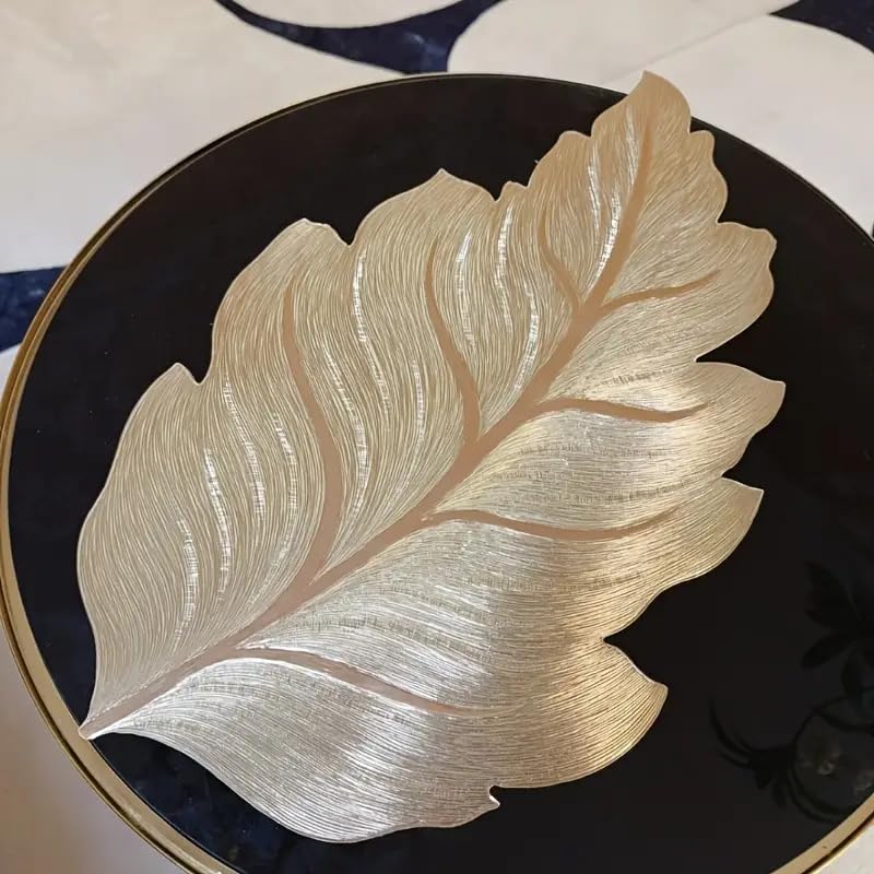Image of Dakshya Industries Set of 2 PVC Waterproof Leaf Design Table Placemats | Premium Gold Finish Dining Table Mats | Heat Resistant, Washable & Anti-Slip | Decorative Kitchen & Dining Mats (Gold)