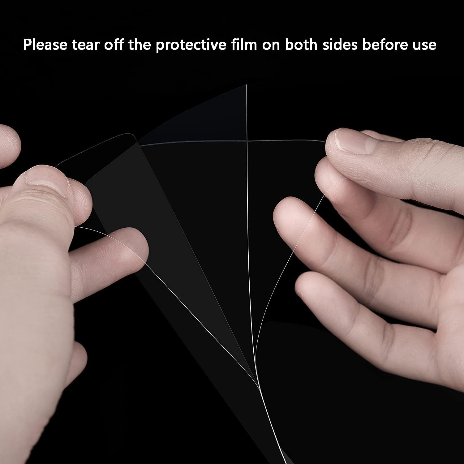 Hands peeling off protective film from an FEP sheet